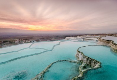 Егейска Одисея през пролетта! 6 нощувки с 6 закуски и 4 вечери, самолетен билет и транспорт с автобус, посещение на Айвалък, Памуккале, Кушадасъ и Анталия - Снимка